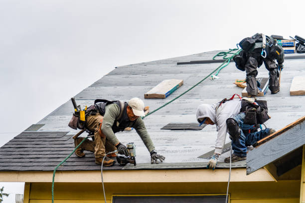 Professional Roofing technician working in Manchester, NH